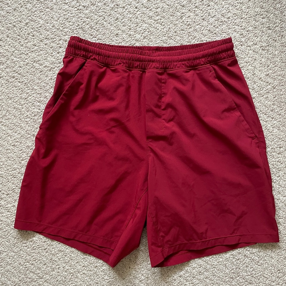 RED LULULEMON SHORTS (S)